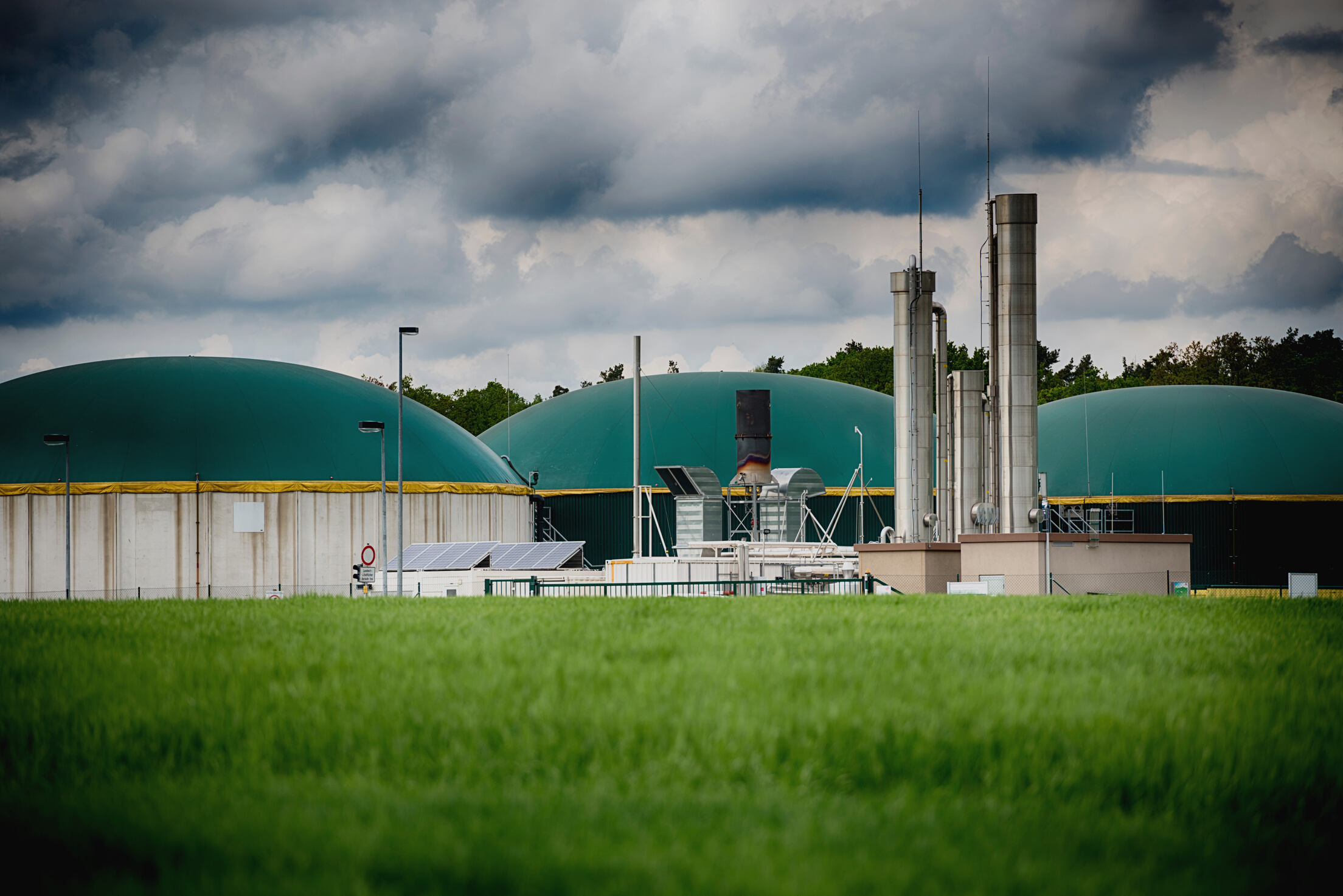 Biomass energy plant under a great cloudscape Energiewende Biogas