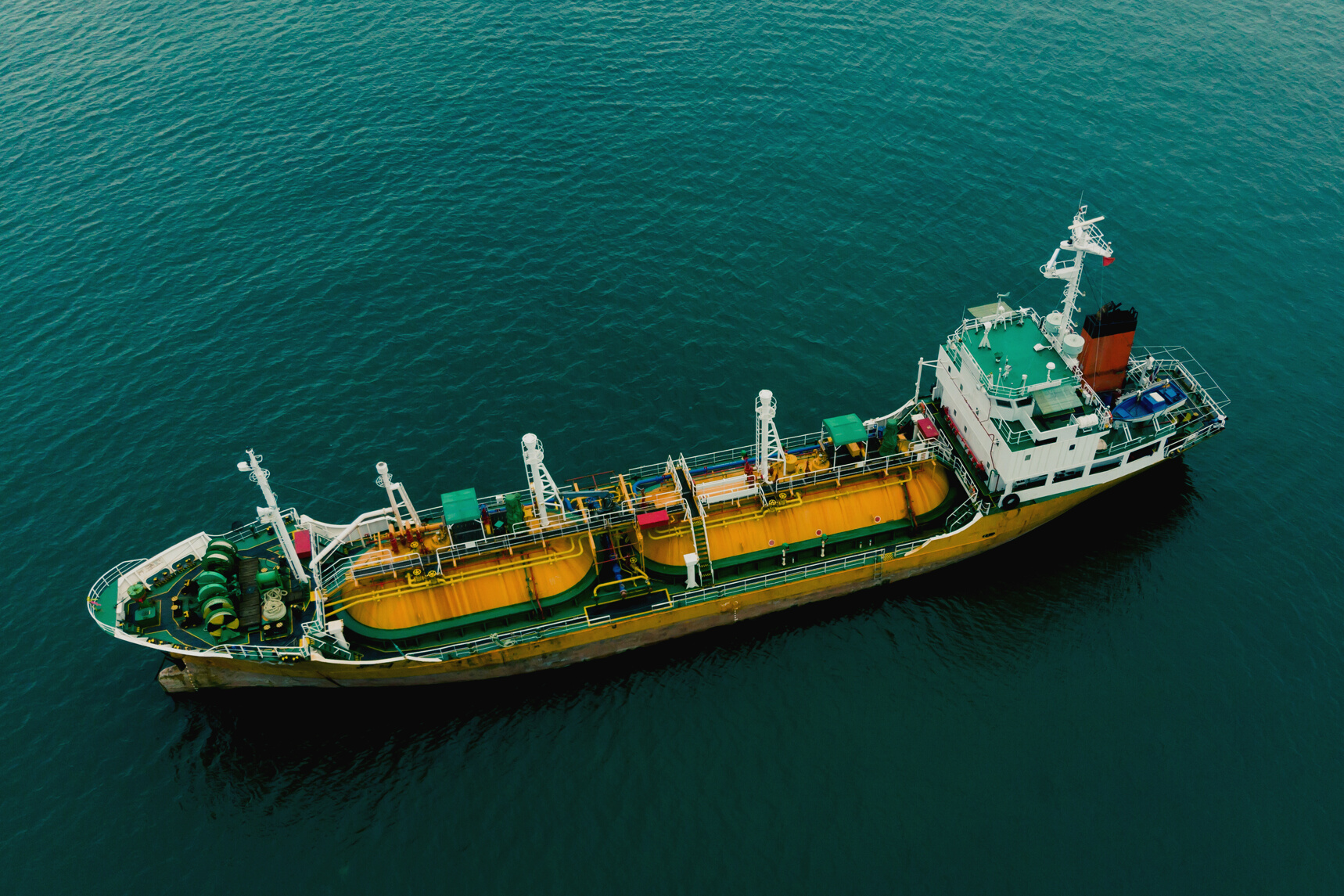 Aerial view of sea freight, Green,yellow oil tanker ship, Lpg, Cng at industrial estate Thailand / Crude Oil tanker to Port of Singapore - import export around in the world