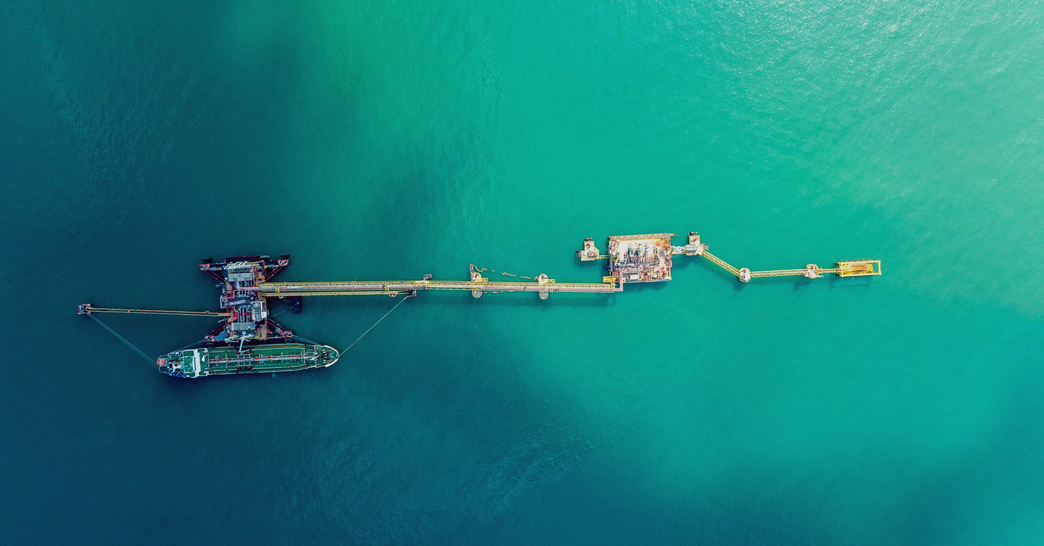 Aerial top view of  LPG gas tanker ship at crude oil terminal  f