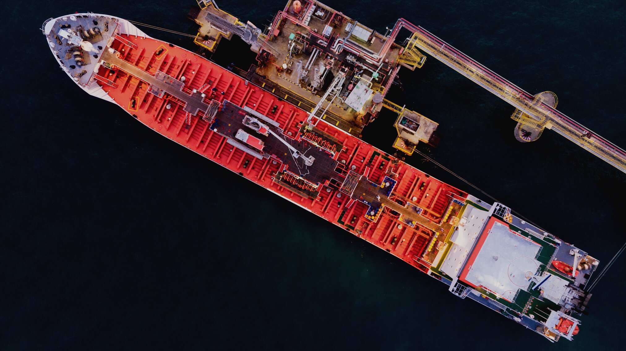 Aerial view of  gas ship LPG ship at pumping port in the sea.